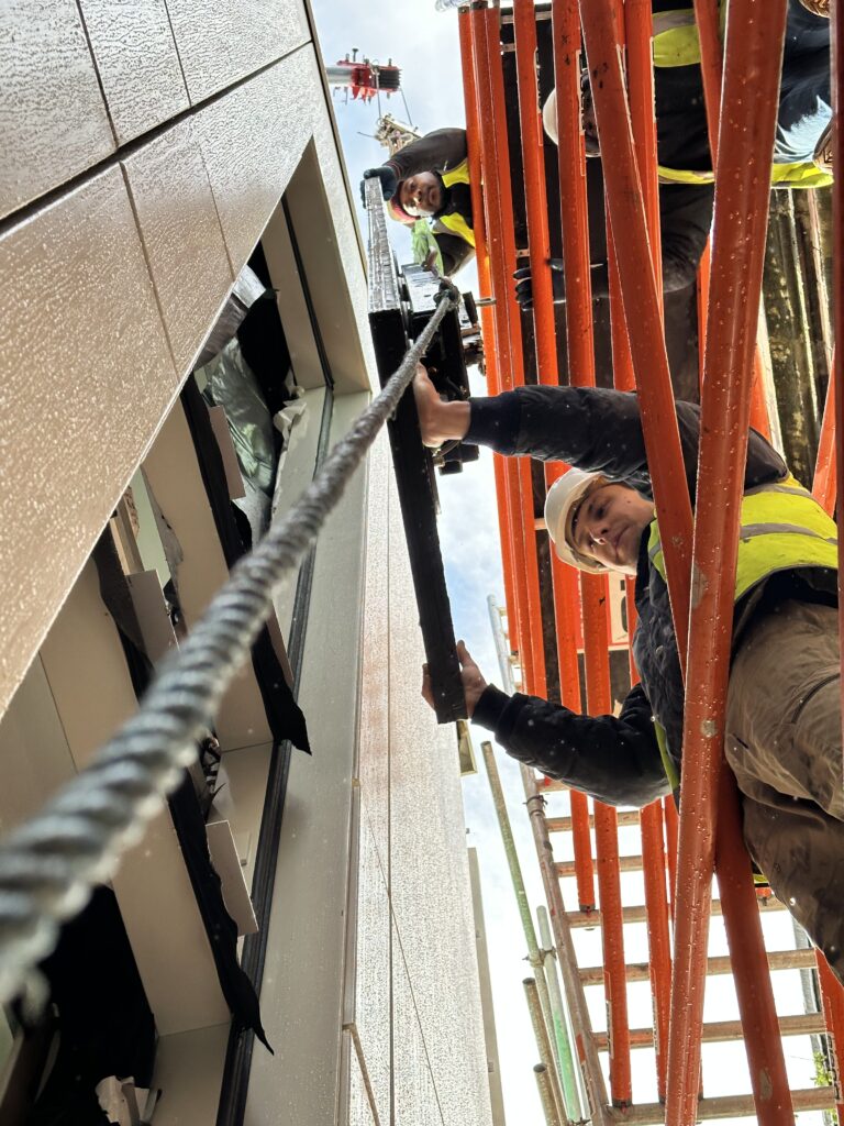 On-site window installation by Advanced Glass ensuring precision and compliance.