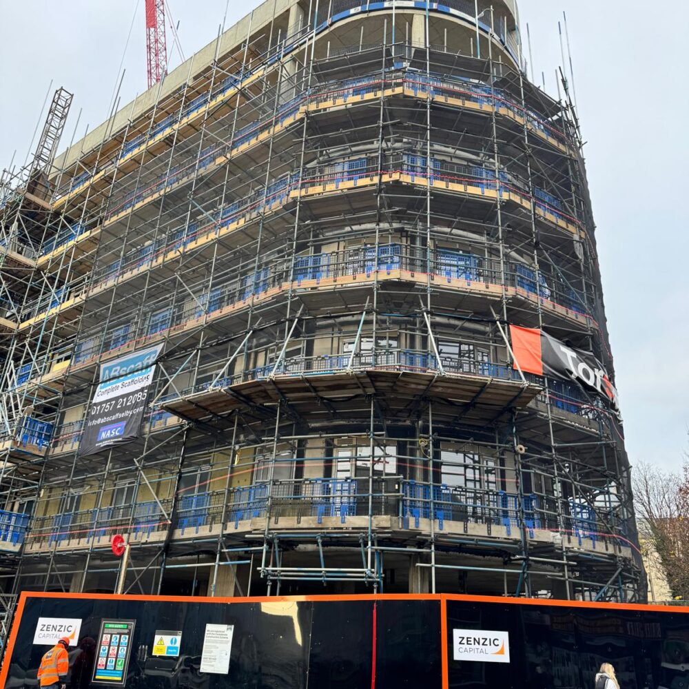 Curtain wall façade with bronze anodized aluminium windows at Burley Street Leeds