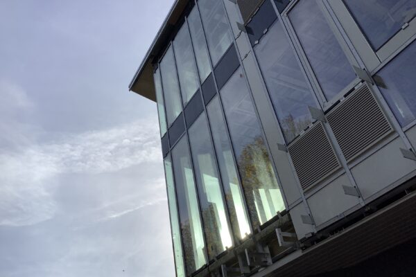 Advanced Glass curtain walling installation at Ty Krishna Temple in Cardiff Bay