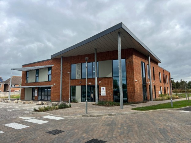Façade specification for a healthcare project featuring brickwork, modern glazing and external finishes on a newly constructed healthcare building.